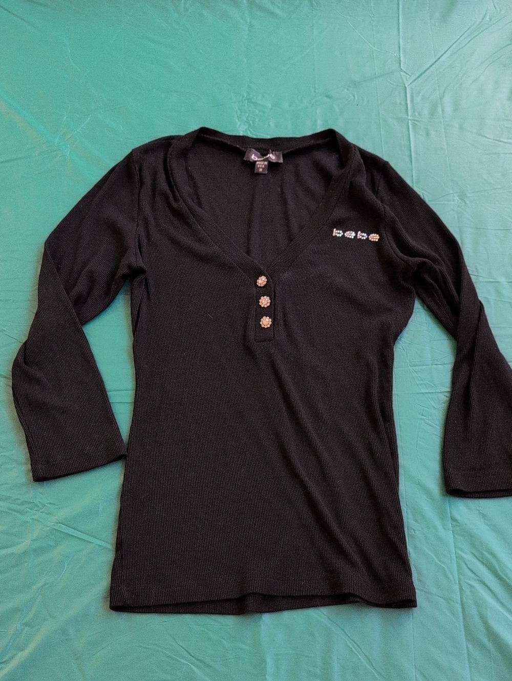 Bebe Black Ribbed V-Neck 3/4 length sleeve top with Rhinestone Logo